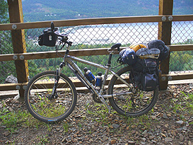 Adrian's mountain bike is packed up with a hornless saddle installed ready for a 10, 000 kilometer tour.