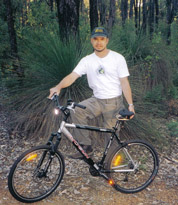 Mountain bike with Spiderflex noseless saddle - on a trail -Western Australia - Ren